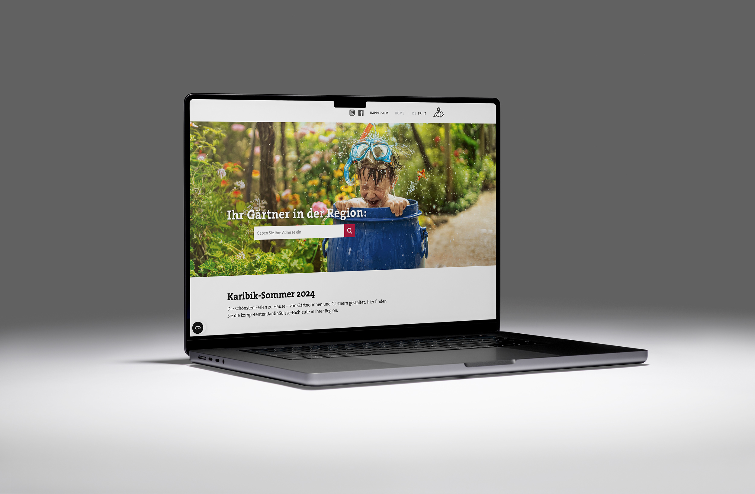 Jardin Suisse-Website auf Laptop Desktop Screen mit Kind beim Planschen.