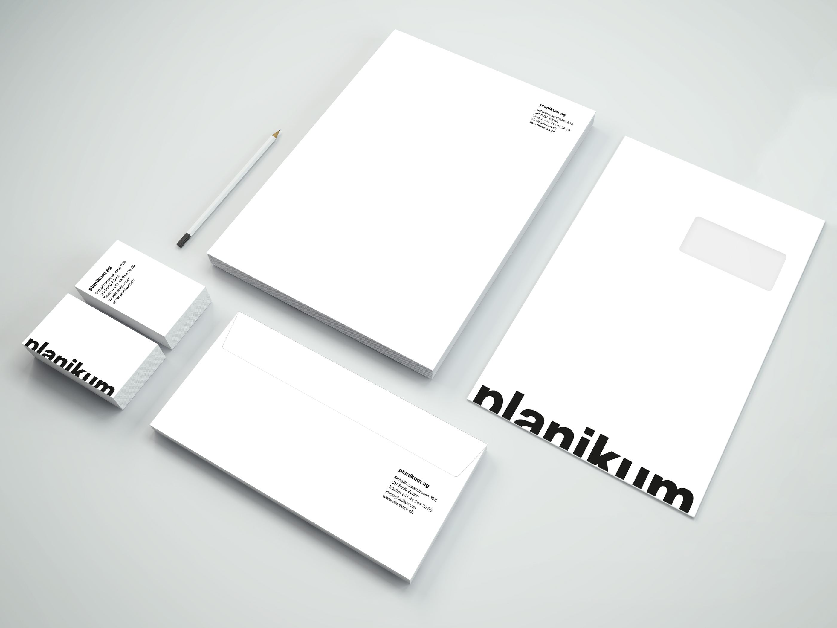 Planikum Briefpapier-Design mit Visitenkarten, Briefbogen und Kuvert.