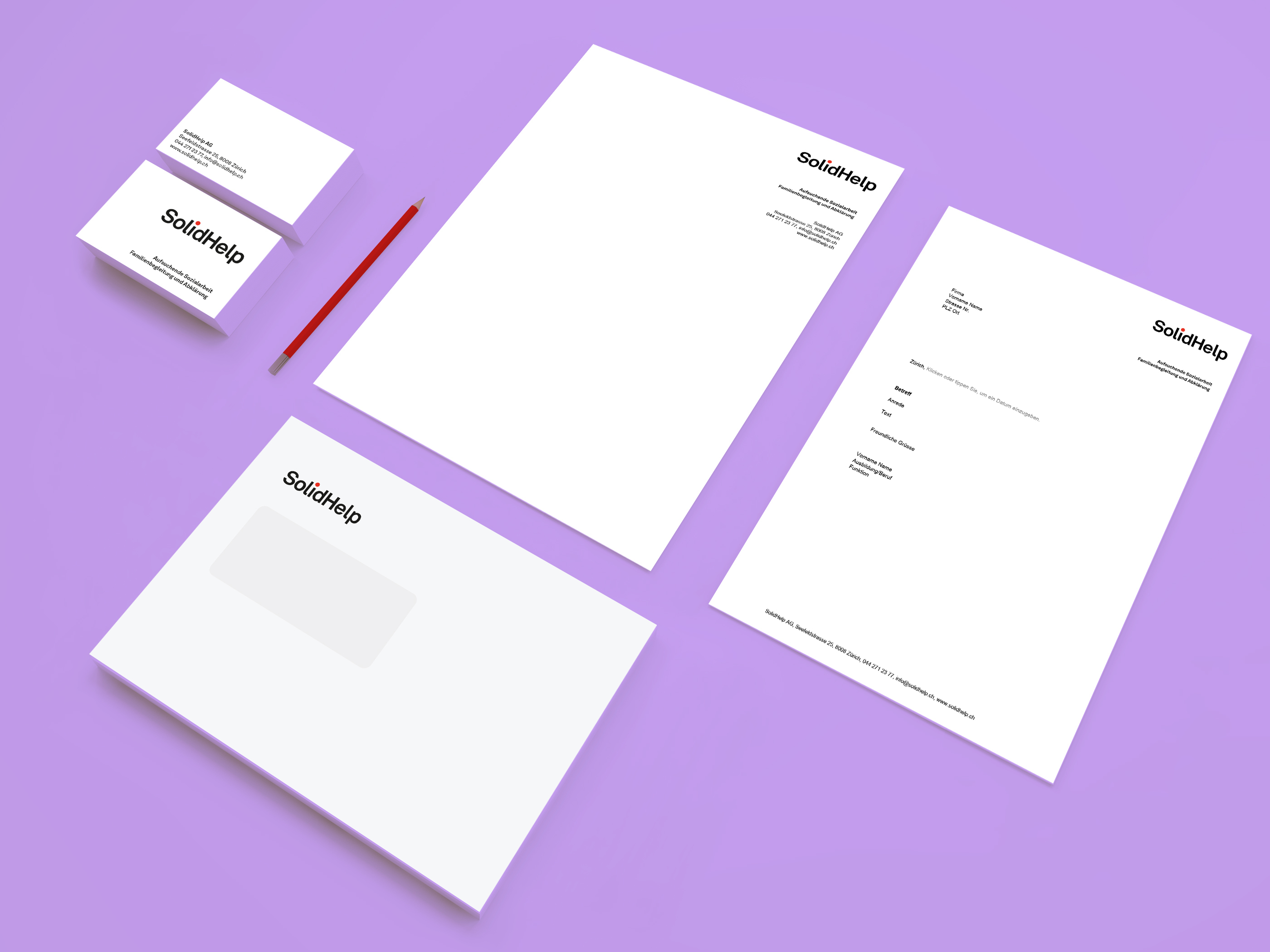 Briefpapier-Set von SolidHelp mit Logo und schlichter Gestaltung.